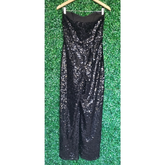 7. Anthropologie Hutch Bow Jumpsuit - Picture 8 of 9